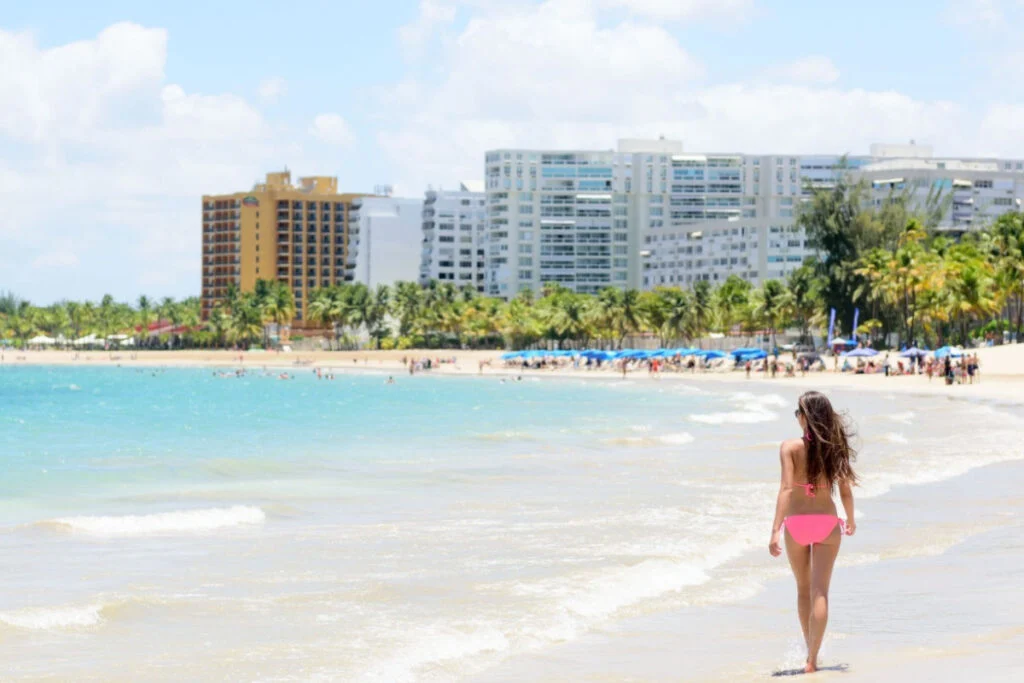 Woman walking on beach in Puerto Rico
