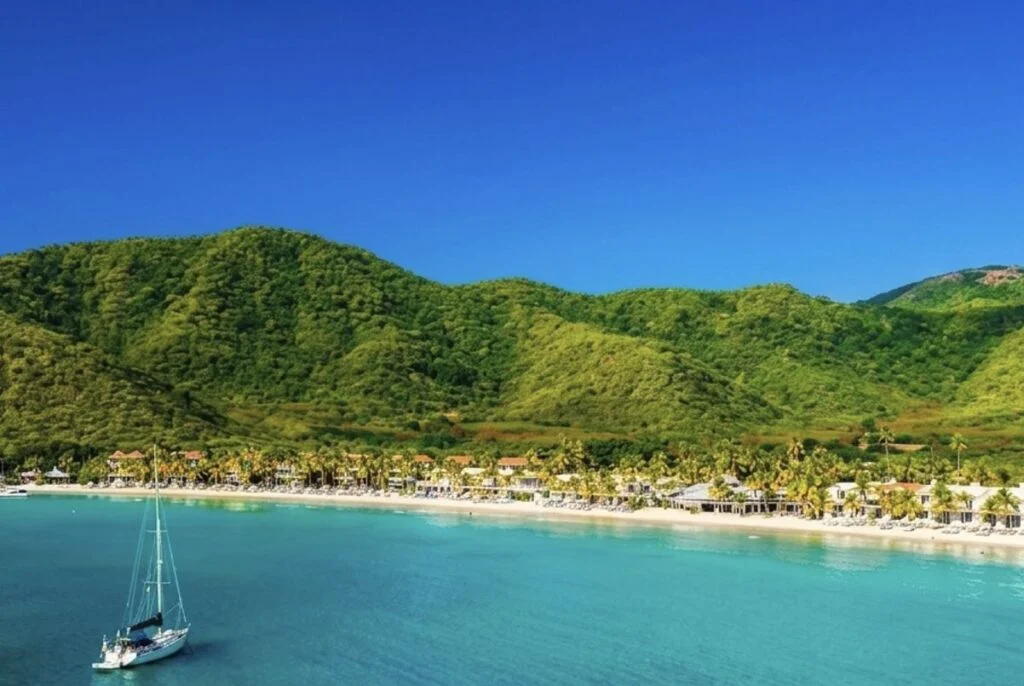 This English-Speaking Caribbean Island With 365 Beaches, 83°F Winters, And $7 Street Food Is Breaking Tourism Records