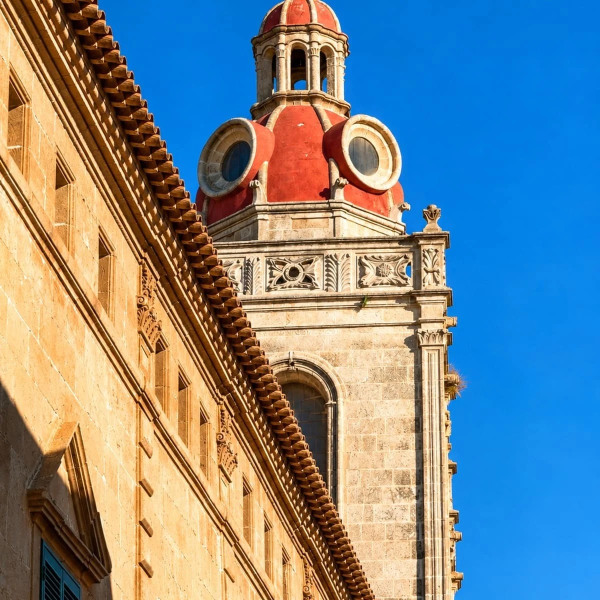 Close Up View Of The Red Belfry Of Convent of Sant Agustí In Ciutadella de Menorca, Spain