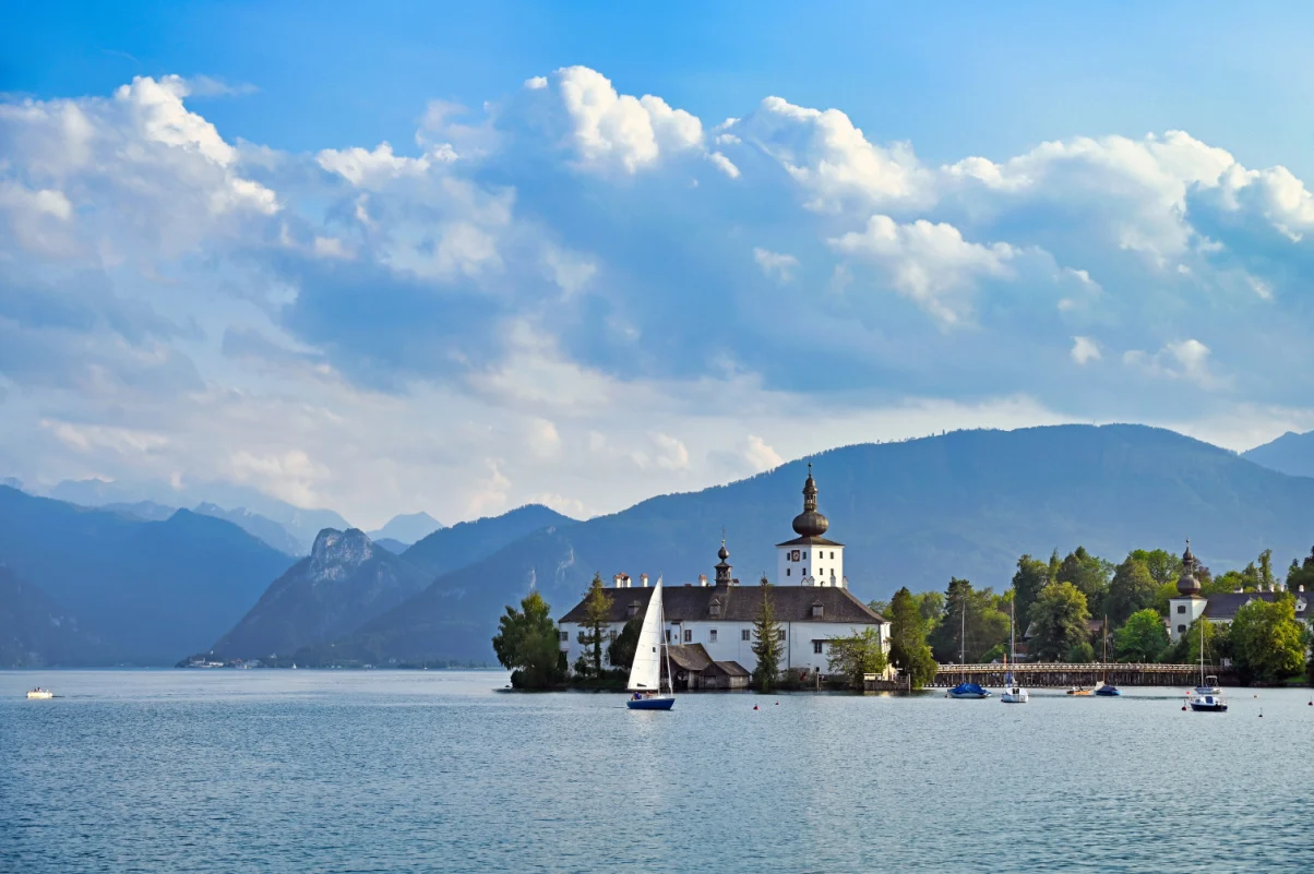 Water Castle Schloss Ort Orth on lake Traunsee in Gmunden landscape, Austria
