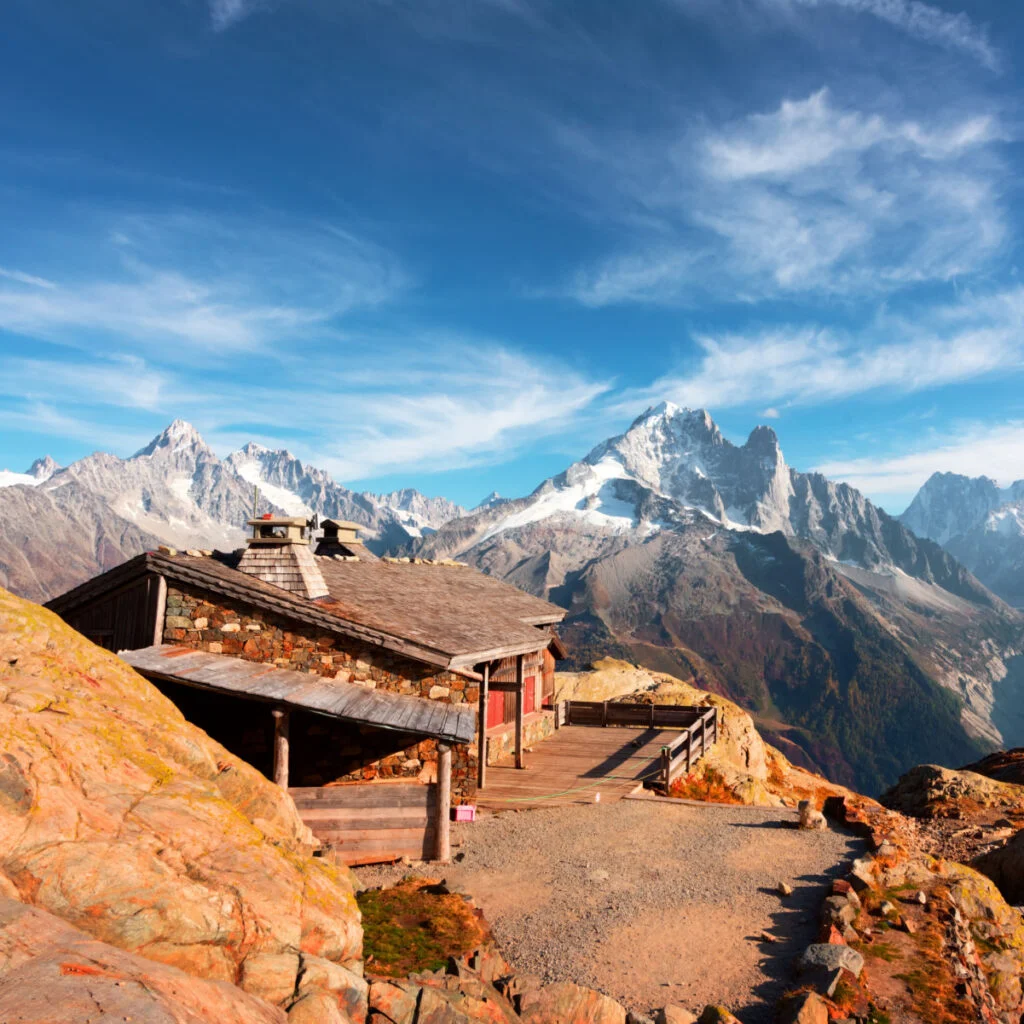 Cabin on Lac Blanc lake in France Alps. Monte Bianco mountain range on background. Vallon de Berard Nature Preserve, Chamonix, Graian Alps. Landscape photography